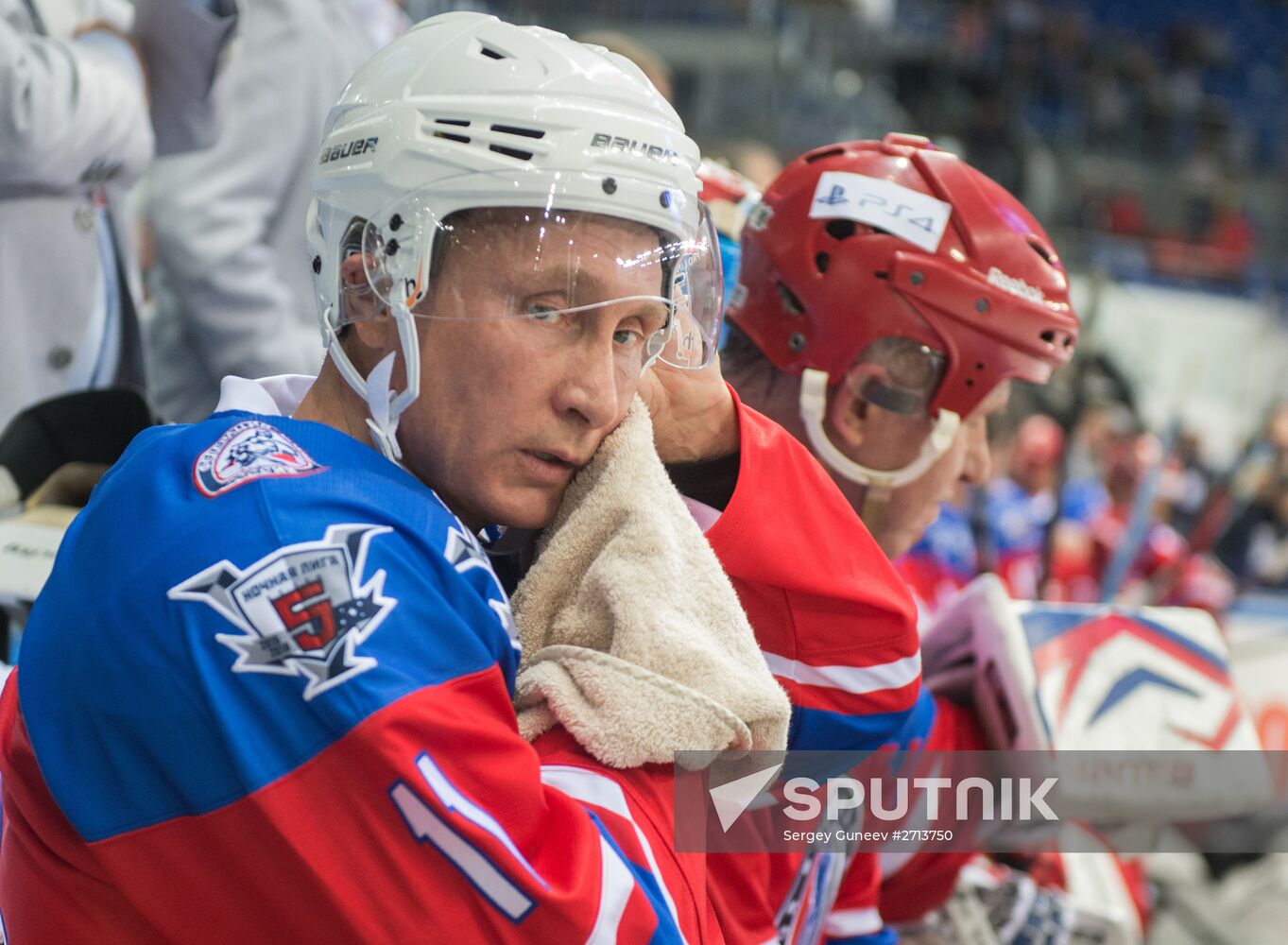 Vladimir Putin takes part in hockey match between Night Hockey League champions and board members and honorary guests