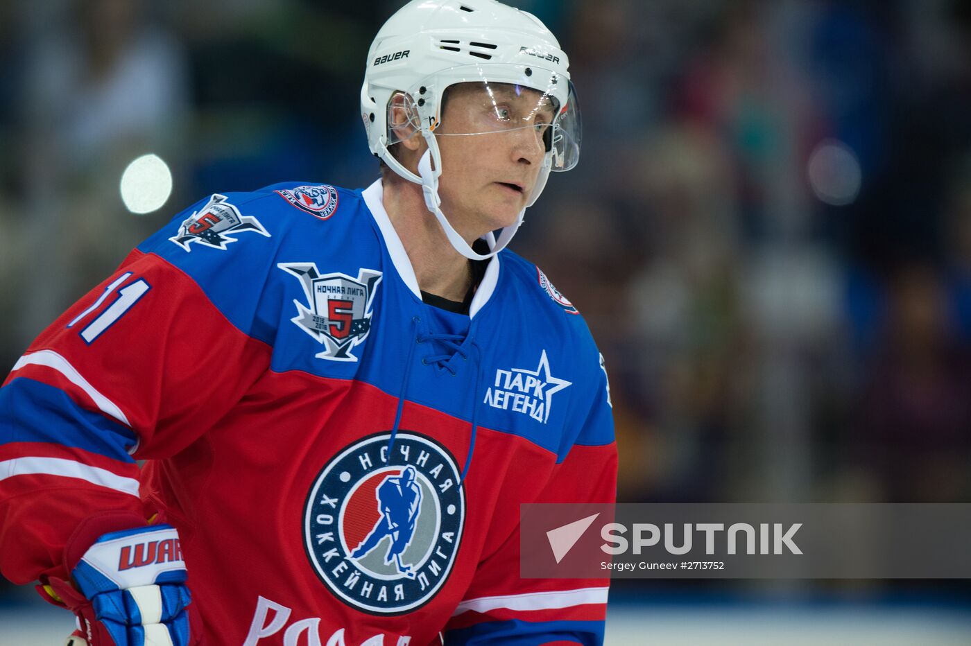 Vladimir Putin takes part in hockey match between Night Hockey League champions and board members and honorary guests