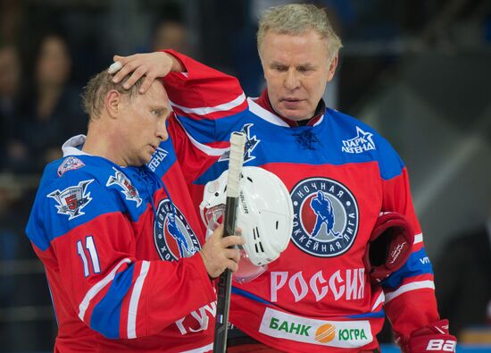 Vladimir Putin takes part in hockey match between Night Hockey League champions and board members and honorary guests