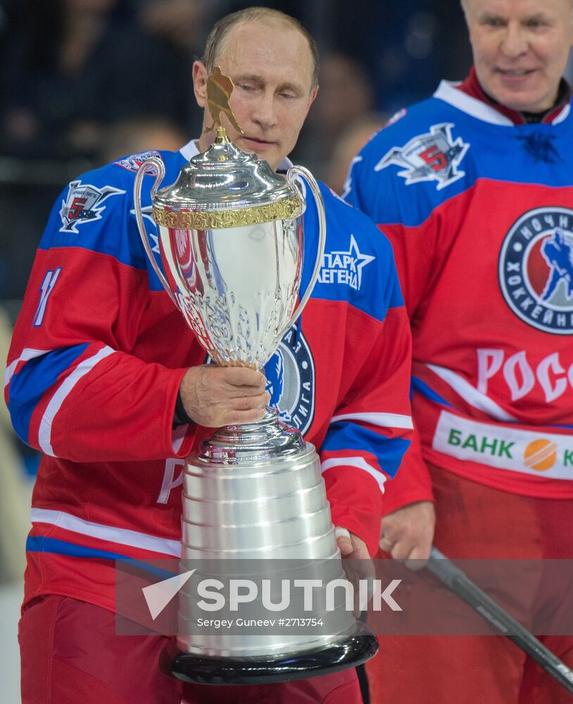 Vladimir Putin takes part in hockey match between Night Hockey League champions and board members and honorary guests
