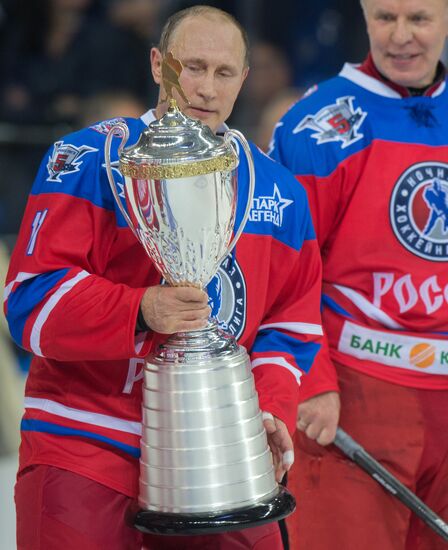 Vladimir Putin takes part in hockey match between Night Hockey League champions and board members and honorary guests