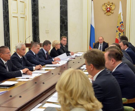 President Vladimir Putin holds a meeting with Russian Government members