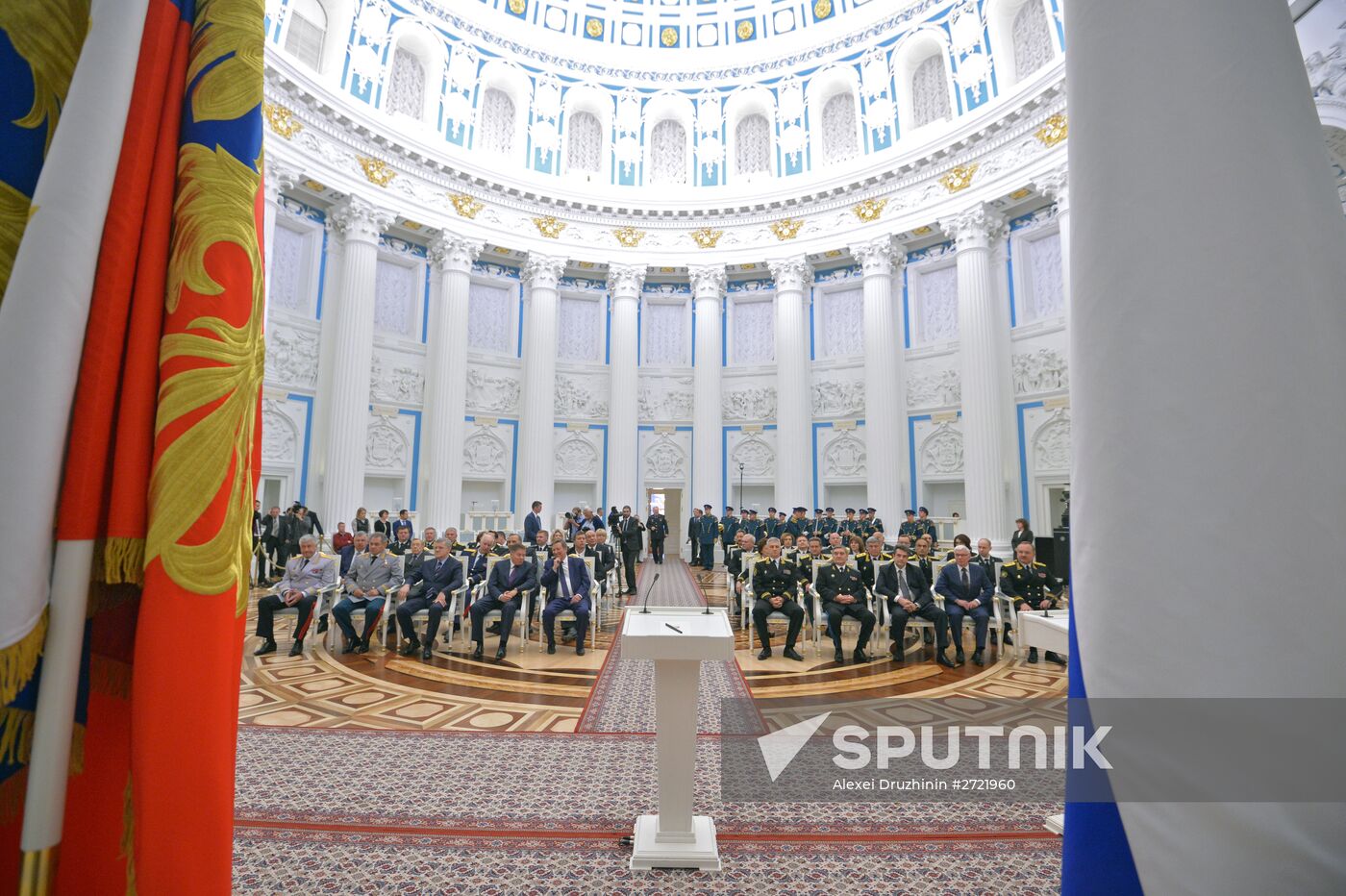 Russian President Vladimir Putin presents banner of Federal Bailiff Service