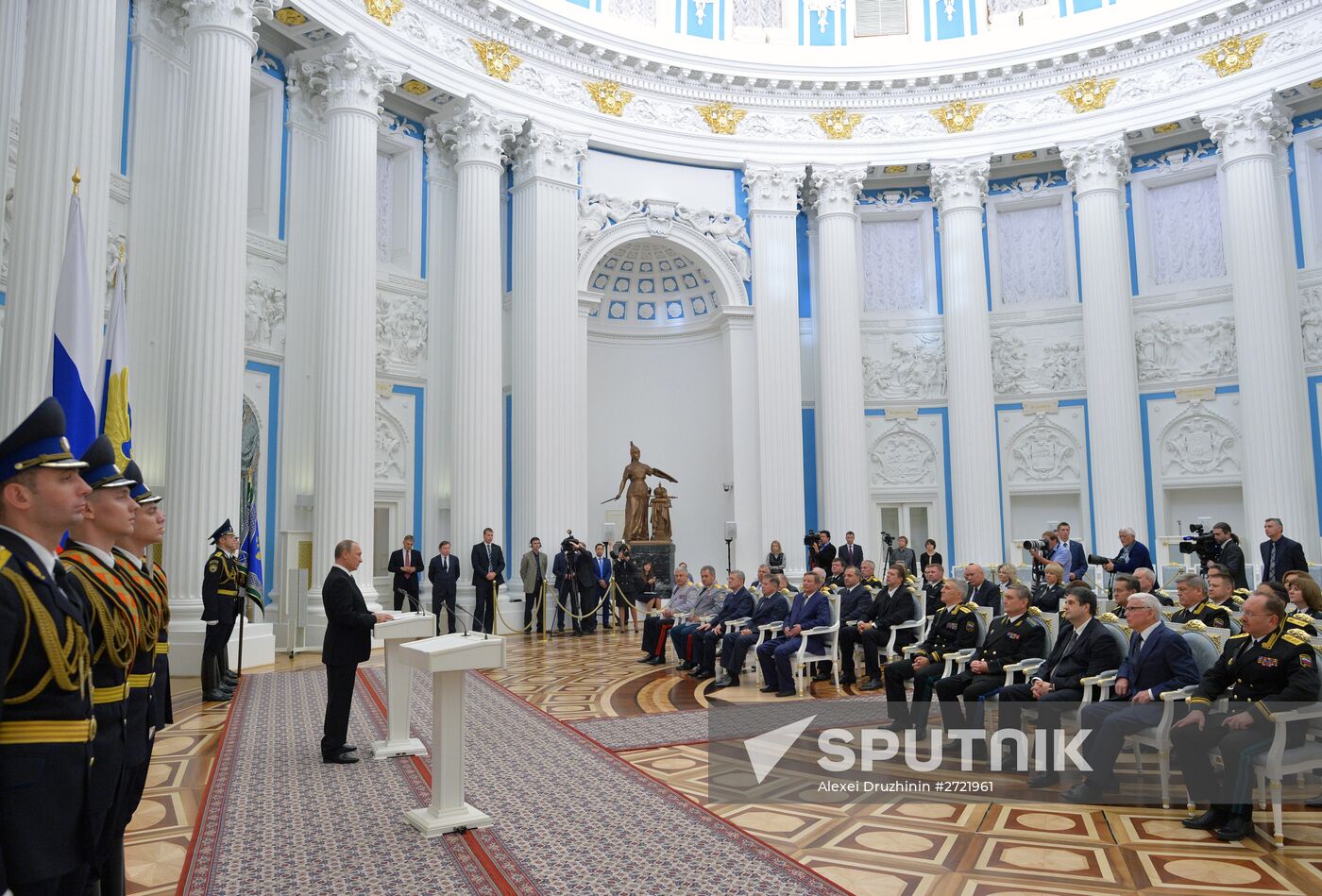 Russian President Vladimir Putin presents banner of Federal Bailiff Service
