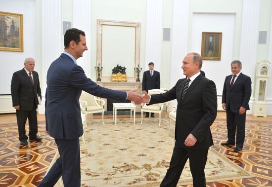 President Vladimir Putin meets with President of Syria Bashar al-Assad
