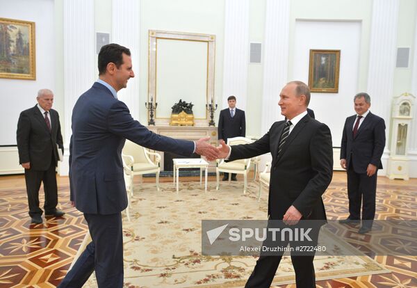 President Vladimir Putin meets with President of Syria Bashar al-Assad