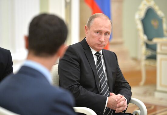 President Vladimir Putin meets with President of Syria Bashar al-Assad