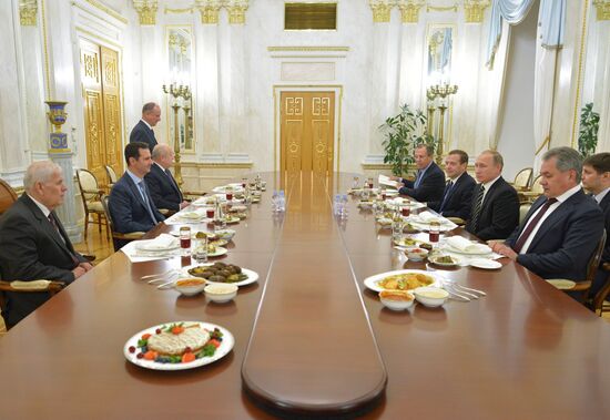 President Vladimir Putin meets with President of Syria Bashar al-Assad