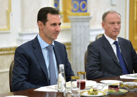 President Vladimir Putin meets with President of Syria Bashar al-Assad