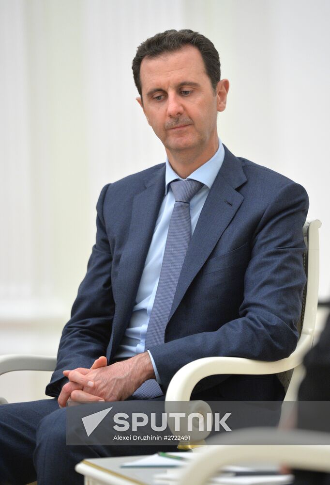President Vladimir Putin meets with President of Syria Bashar al-Assad