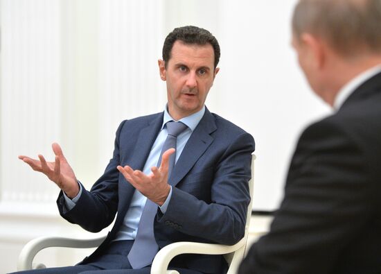 President Vladimir Putin meets with President of Syria Bashar al-Assad