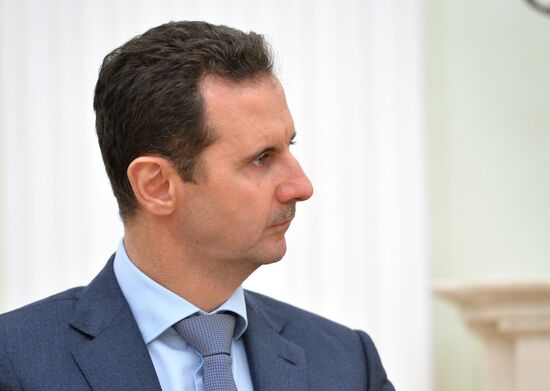 President Vladimir Putin meets with President of Syria Bashar al-Assad