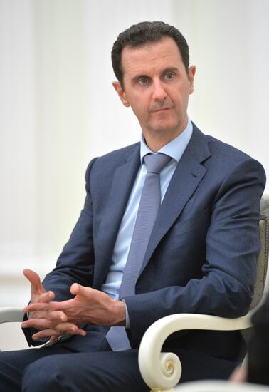 President Vladimir Putin meets with President of Syria Bashar al-Assad