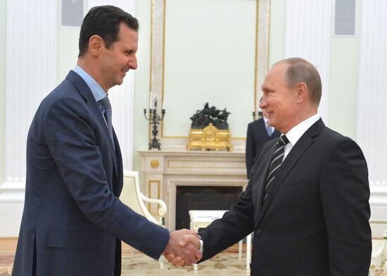 President Vladimir Putin meets with President of Syria Bashar al-Assad