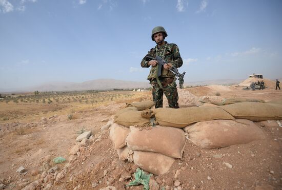 Syrian Arab Army's 2nd Corps 10th Division off Katana city, Syria