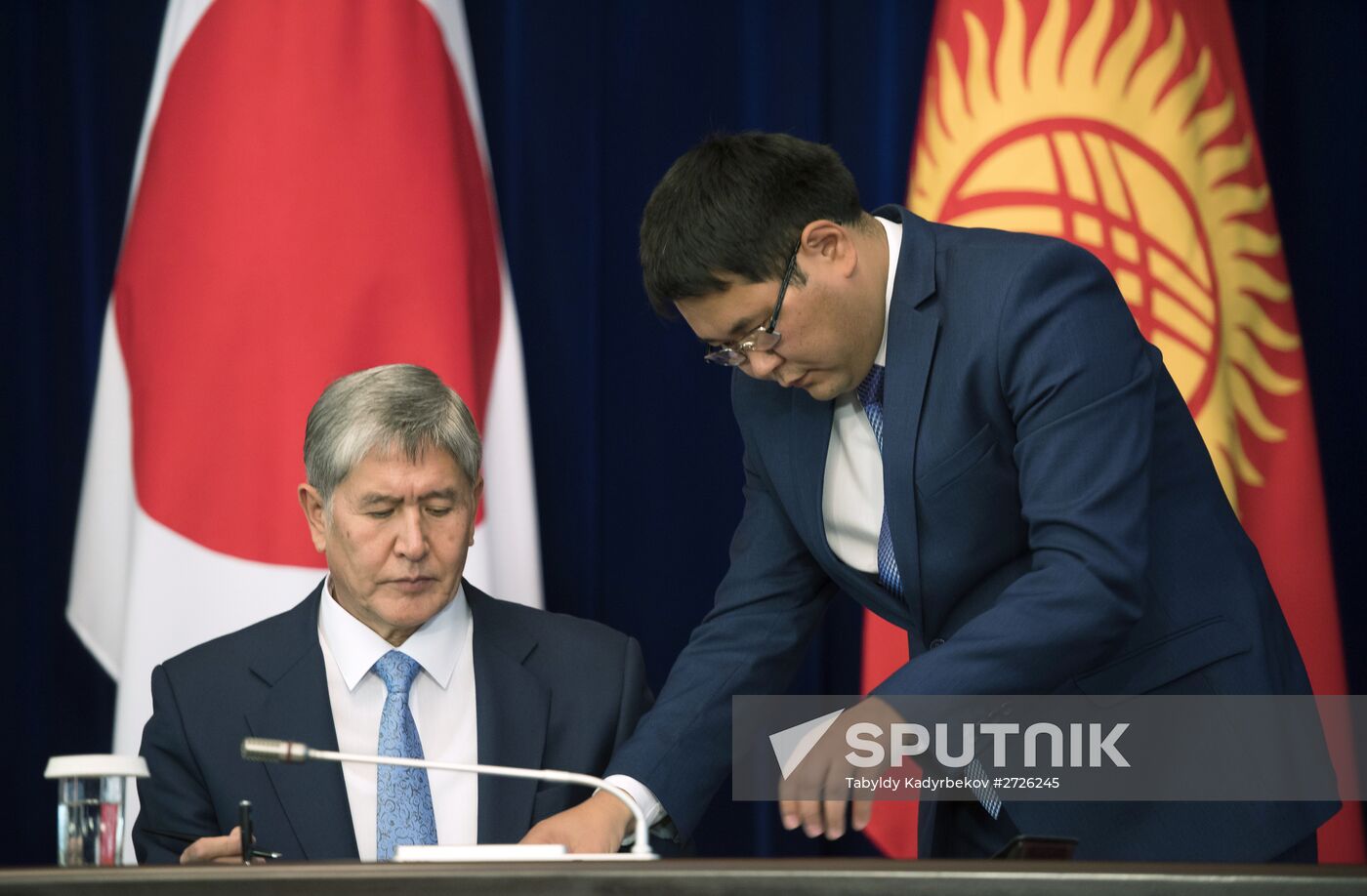 Kyrgyz President Almazbek Atambayev seen at the ceremony of signing Kyrgyz-Japanese treaties on bilateral cooperation, following the meeting with japanese Prime Minister Shonzo Abe in Bishkek. Location: Kyrgyzstan, Bishkek. Author: Tabyldy Kadyrbekov/Sputnik. Japanese Prime Minister Shinzo Abe visits Kyrgystan