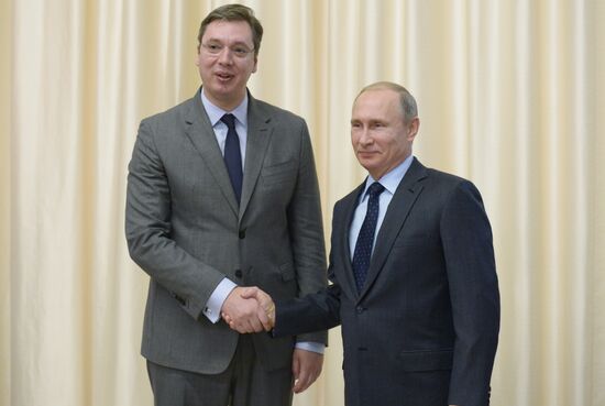 Russian President Vladimir Putin meets with Serbian Prime Minister Aleksandar Vucic