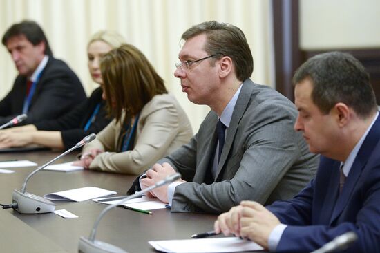 Russian President Vladimir Putin meets with Serbian Prime Minister Aleksandar Vucic
