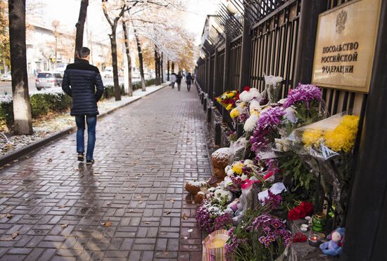 Flowers in memory of Airbus A321 crash victims near Russian embassies in foreign countries