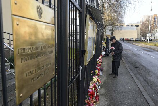 Flowers in memory of Airbus A321 crash victims near Russian embassies in foreign countries