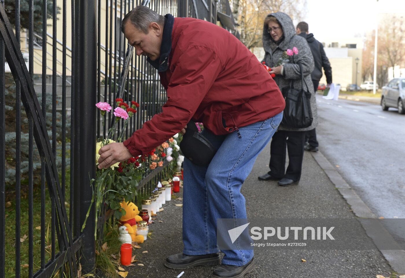 Flowers in memory of Airbus A321 crash victims near Russian embassies in foreign countries