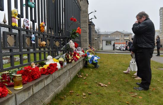 Flowers in memory of Airbus A321 crash victims near Russian embassies in foreign countries