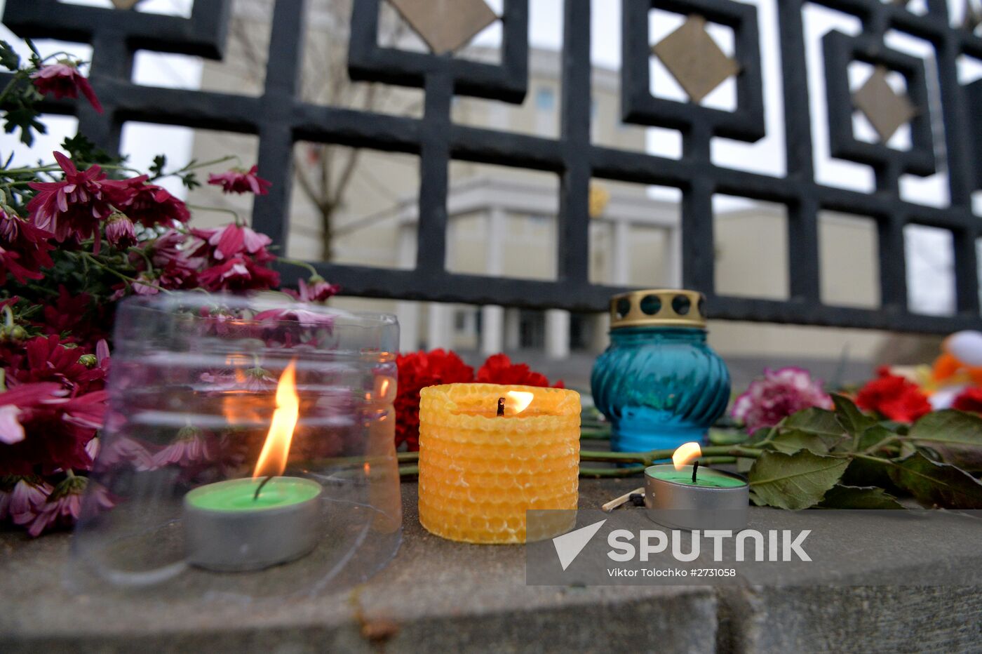 Flowers in memory of Airbus A321 crash victims near Russian embassies in foreign countries