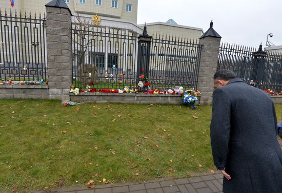 Flowers in memory of Airbus A321 crash victims near Russian embassies in foreign countries