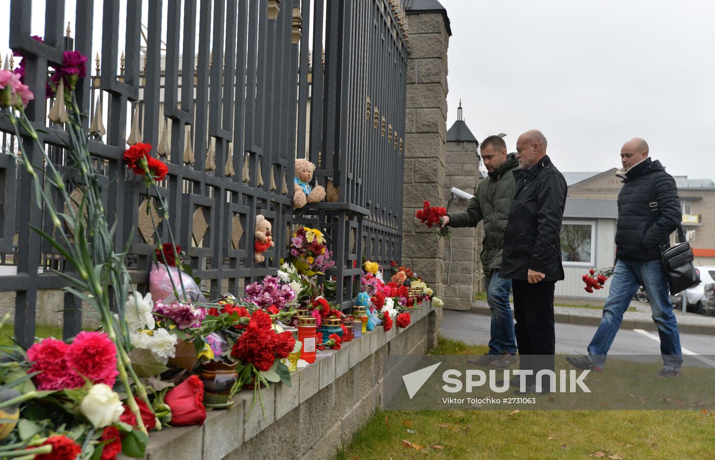 Flowers in memory of Airbus A321 crash victims near Russian embassies in foreign countries