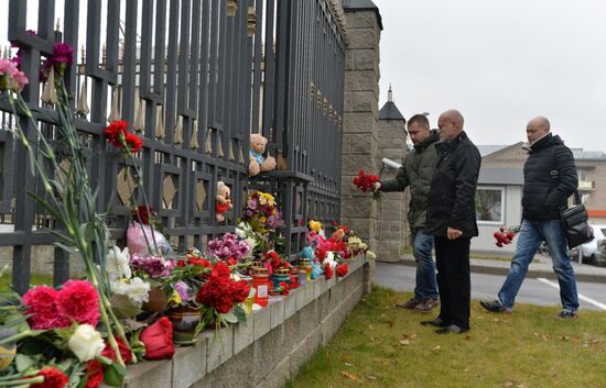 Flowers in memory of Airbus A321 crash victims near Russian embassies in foreign countries