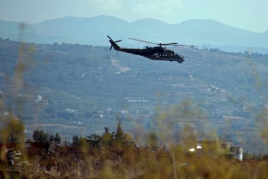 Russian warplanes at Hemeimeem air base in Syria