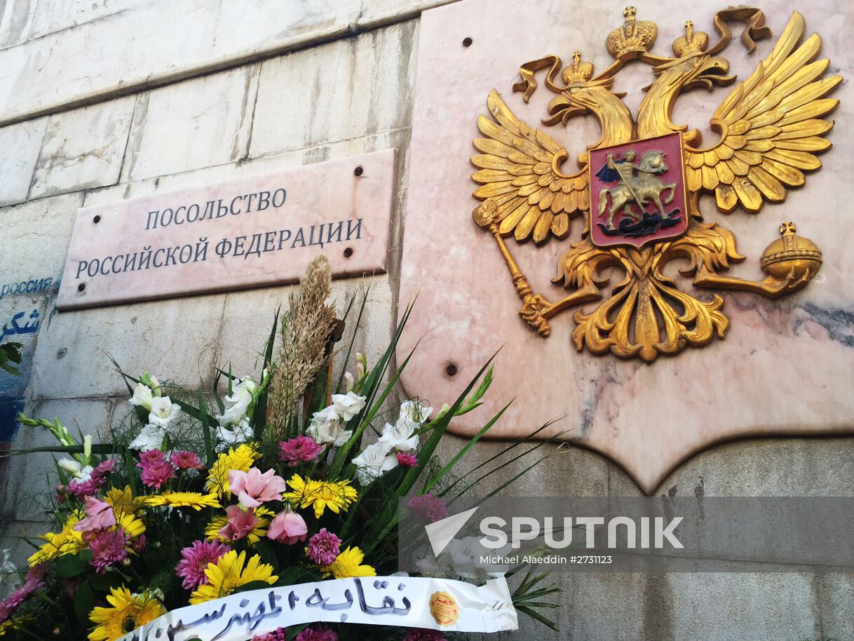 Flowers in memory of Airbus A321 crash victims near Russian embassies in foreign countries