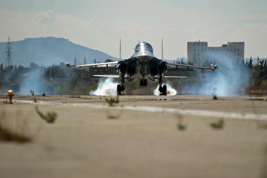 Russian warplanes at Hemeimeem air base in Syria