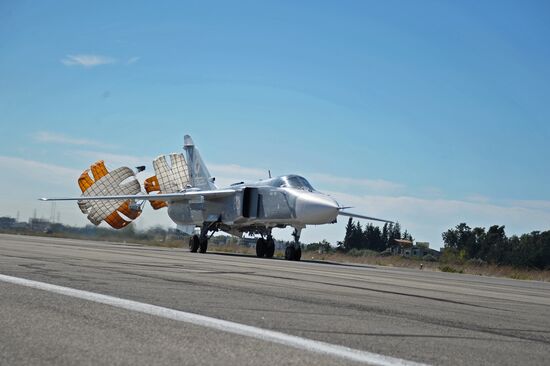Russian warplanes at Hemeimeem air base in Syria