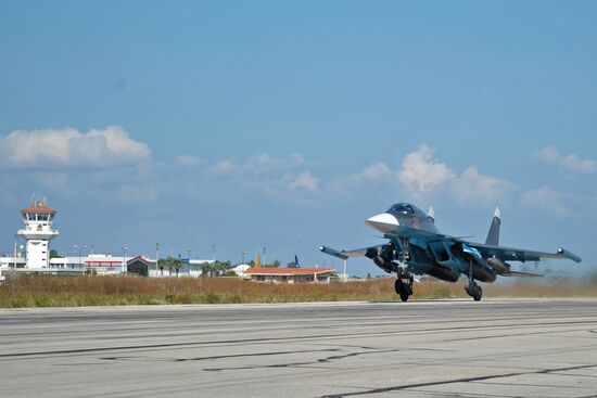 Russian warplanes at Hemeimeem air base in Syria