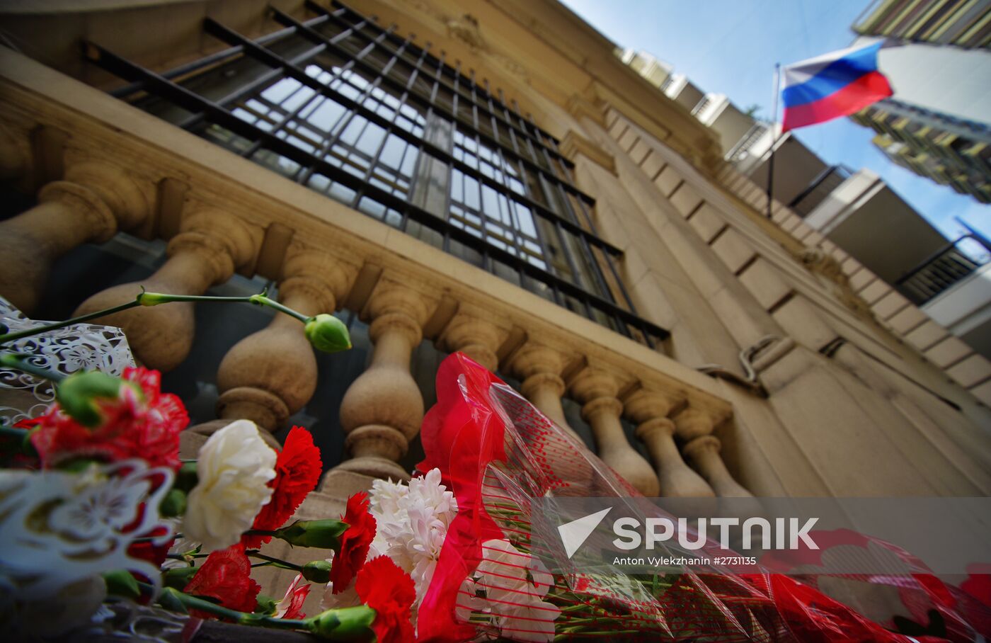 Flowers in memory of Airbus A321 crash victims near Russian embassies in foreign countries