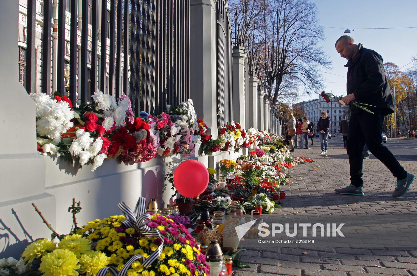 Flowers in memory of Airbus A321 crash victims near Russian embassies in foreign countries