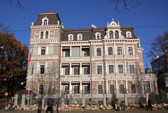 Flowers in memory of Airbus A321 crash victims near Russian embassies in foreign countries