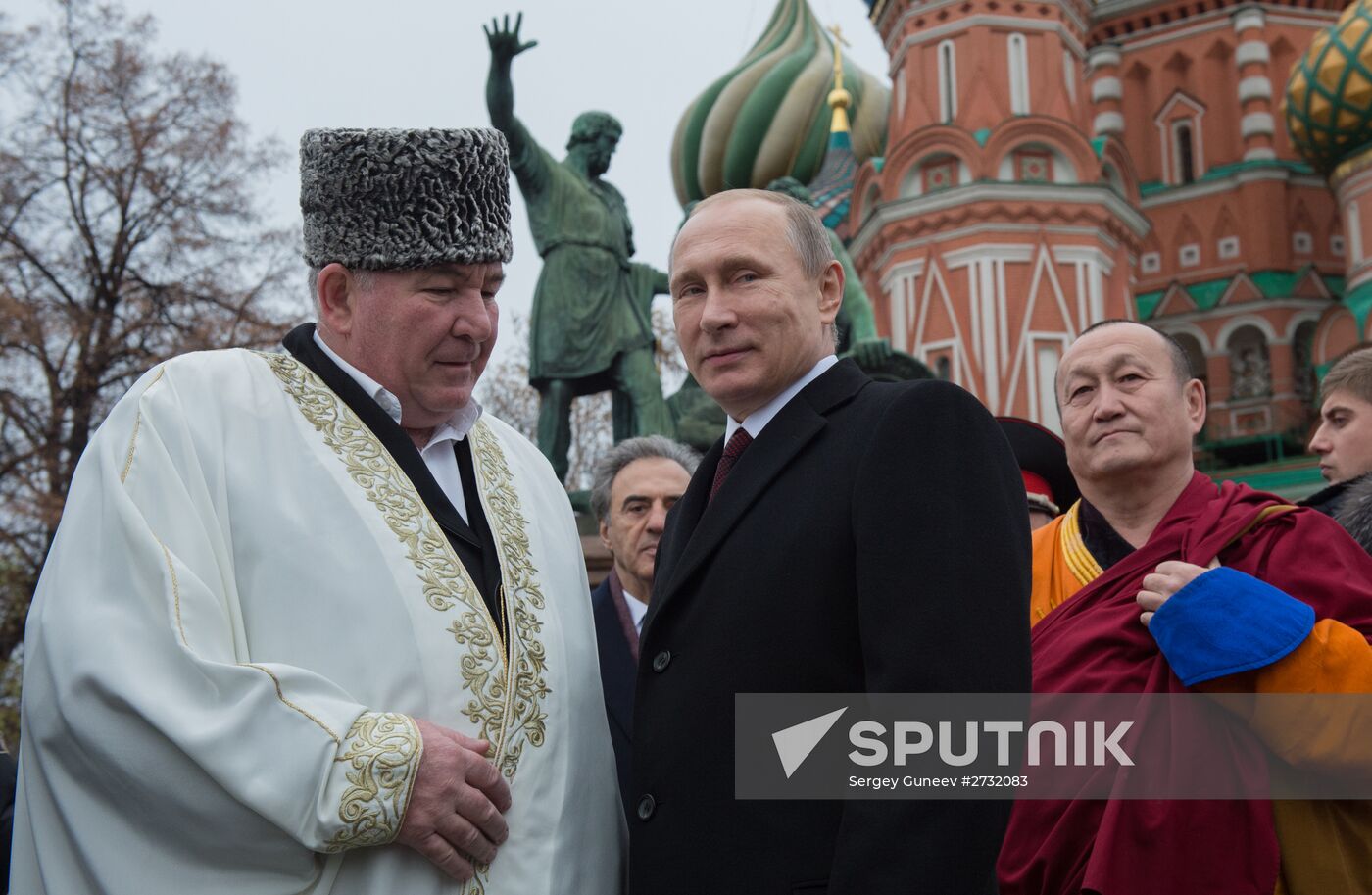 President Putin lays flowers at Minin and Pozharsky monument on Red Square