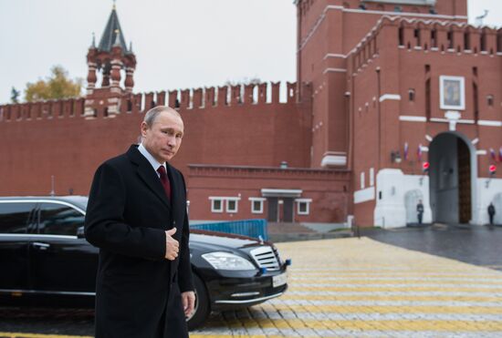 President Putin lays flowers at Minin and Pozharsky monument on Red Square