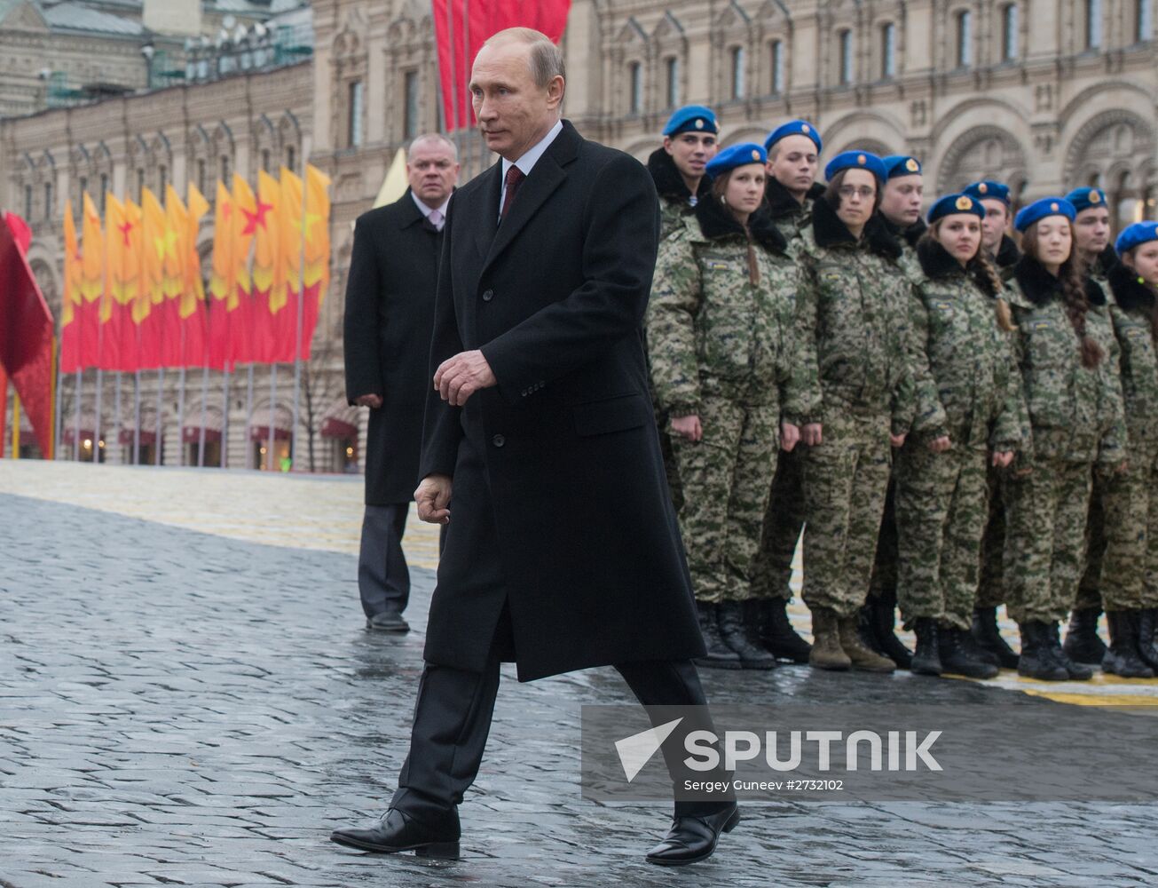 President Putin lays flowers at Minin and Pozharsky monument on Red Square