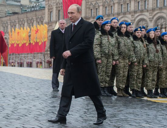 President Putin lays flowers at Minin and Pozharsky monument on Red Square