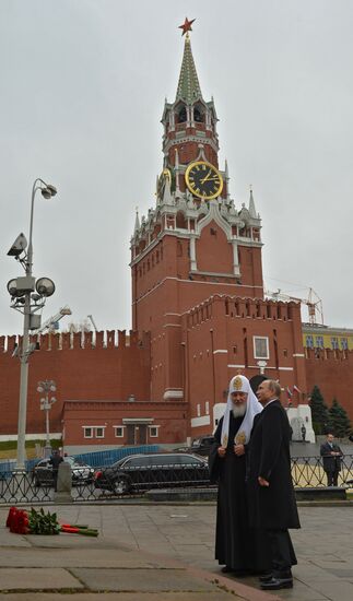 President Putin lays flowers at Minin and Pozharsky monument on Red Square