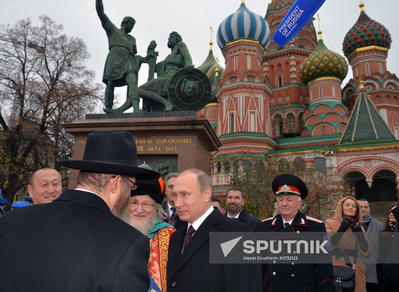 President Putin lays flowers at Minin and Pozharsky monument on Red Square