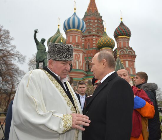 President Putin lays flowers at Minin and Pozharsky monument on Red Square