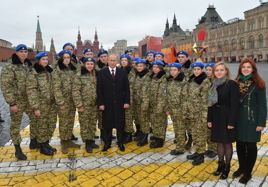 President Putin lays flowers at Minin and Pozharsky monument on Red Square