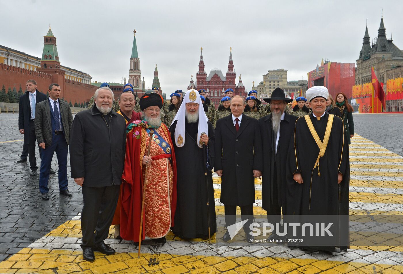 President Putin lays flowers at Minin and Pozharsky monument on Red Square