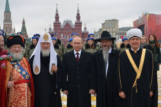 President Putin lays flowers at Minin and Pozharsky monument on Red Square