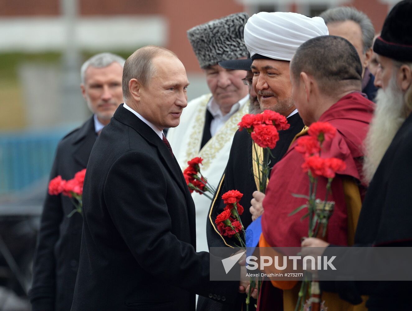 President Putin lays flowers at Minin and Pozharsky monument on Red Square