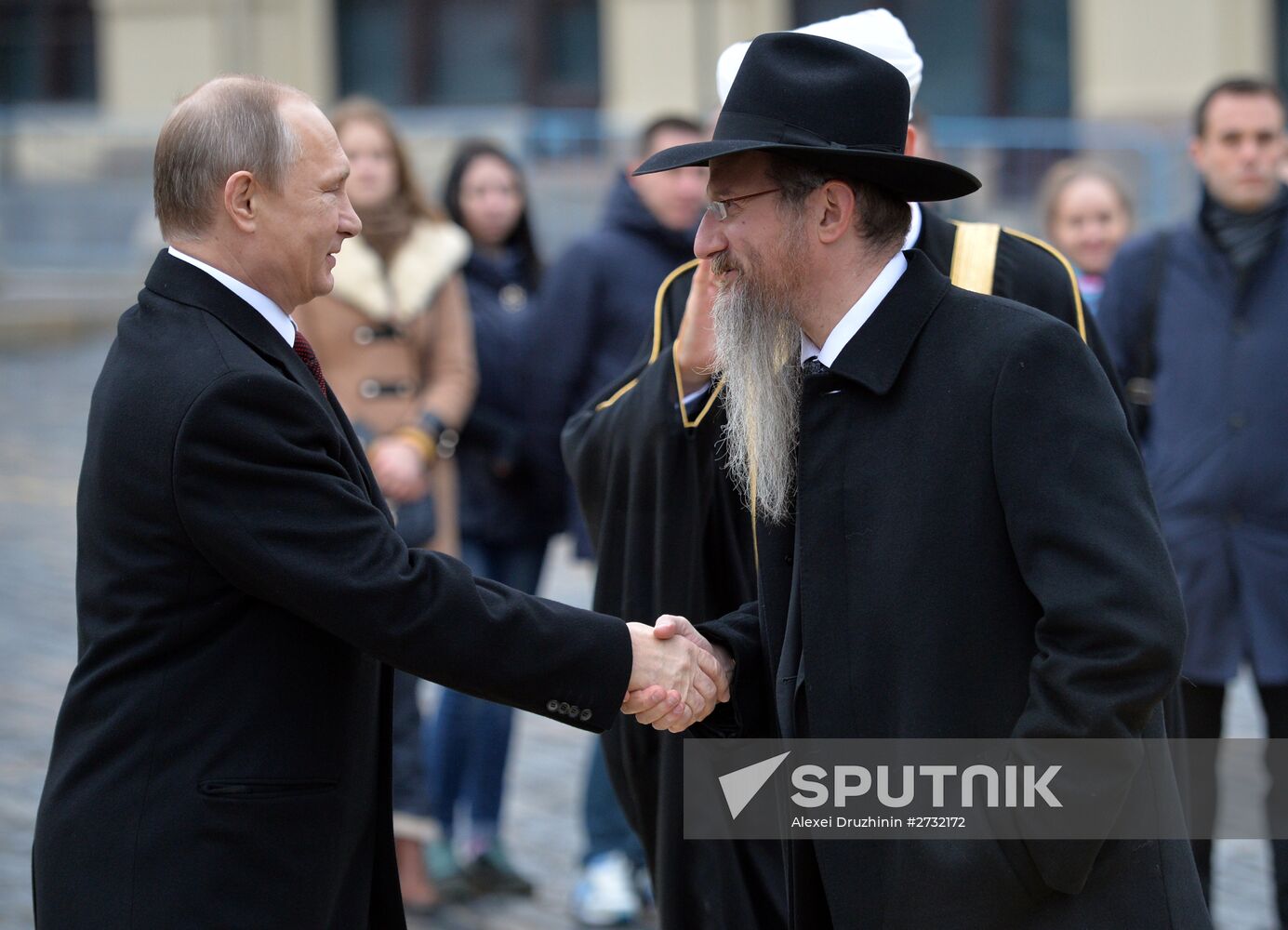 President Putin lays flowers at Minin and Pozharsky monument on Red Square